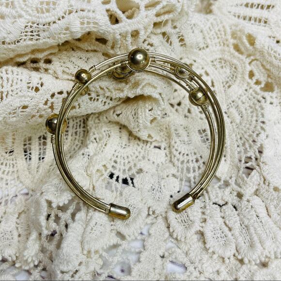 Gold color bracelet thin bands and beads - Picture 3 of 7